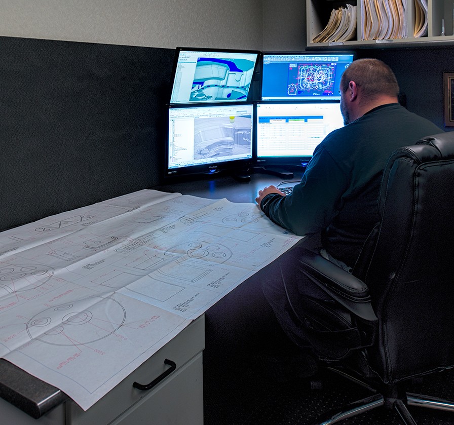 Consultant reviewing models and drawings